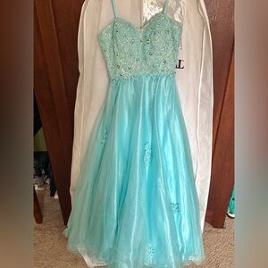 Princess style dress with puffy undercoat. Corset style top